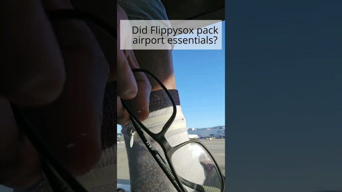 Flippysox keeping the glasses safe before takeoff 🧦✈️👓 @flysfo #TravelEssentials #SanFranciscoAir