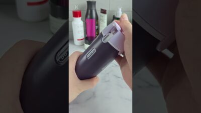 This purple bottle just changed my travel routine 💜 #travelessentials #travelbottle #giftforher